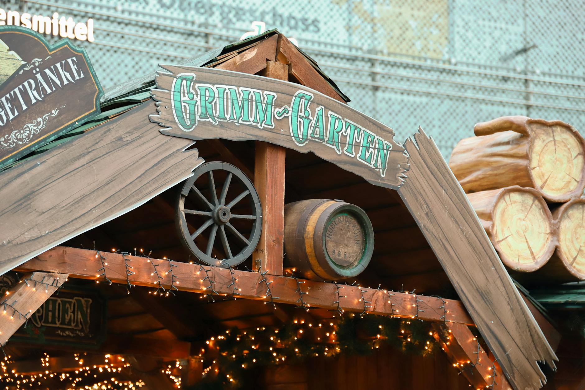 Munich Christmas Markets: Complete Guide 3 Traditional wooden Christmas market stalls in Munich decorated with lights