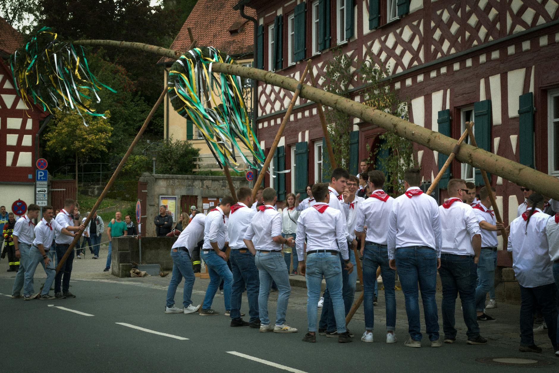 Bavarian Culture Traditions: A Visitor's Guide to Customs & Folklore 3 Bavarian Maypole raised in a village square with brass band