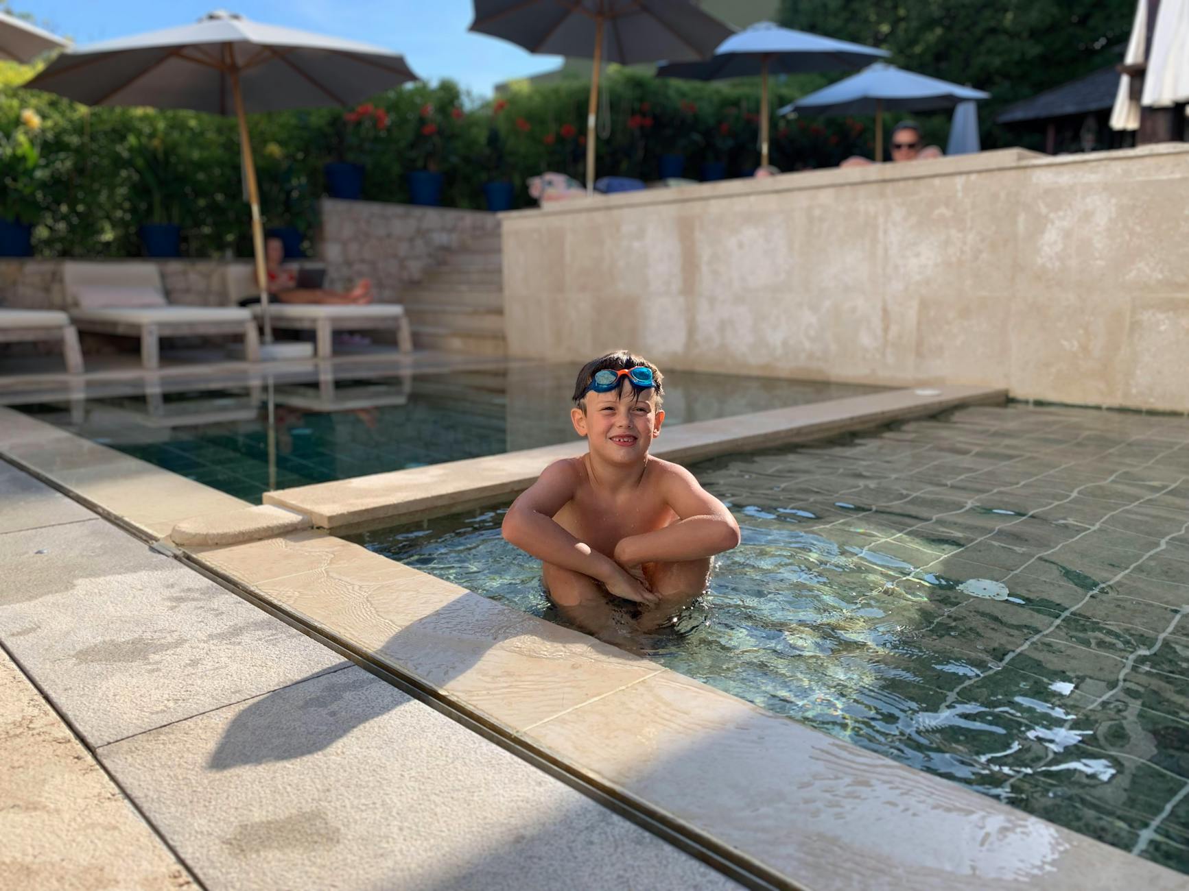 Family Hotels in Munich: 15 Best Kid-Friendly Stays for 2026 2 Charles Hotel Munich indoor pool with families swimming during dedicated kids' swim hours