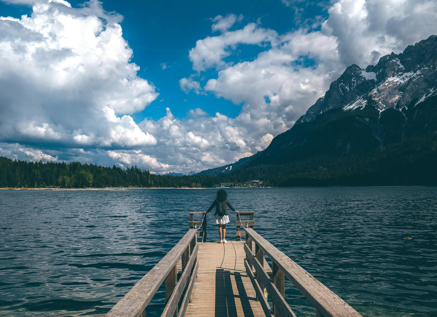 Alpine lake with families swimming