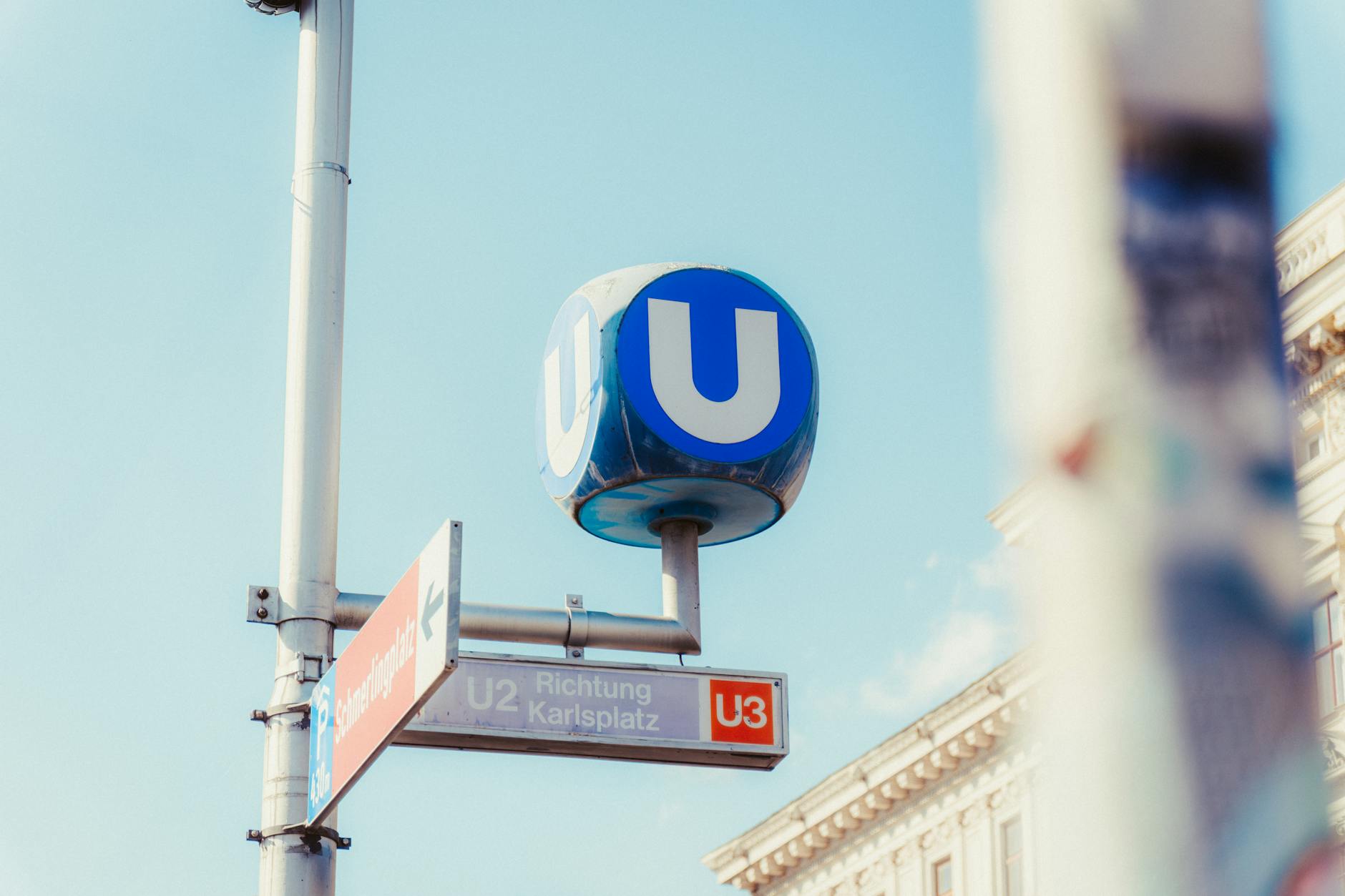 Family Hotels in Munich: 15 Best Kid-Friendly Stays for 2026 4 Family with kids walking near Munich Marienplatz with stroller and U-Bahn entrance