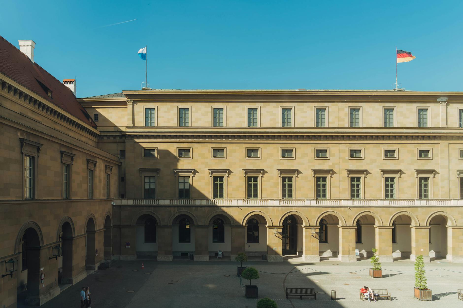 Munich Hidden Gems: 25 Secret Spots Most Tourists Miss 6 Hidden Munich courtyard with cobblestones and arcade in Westend neighborhood