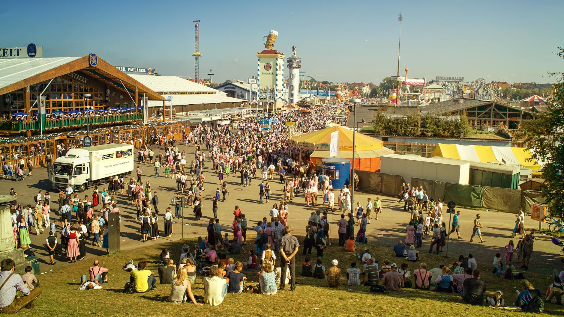Munich Hotel Booking Tips: When & How to Save Up to 50% 3 Oktoberfest crowds outside a Munich hotel during peak booking season