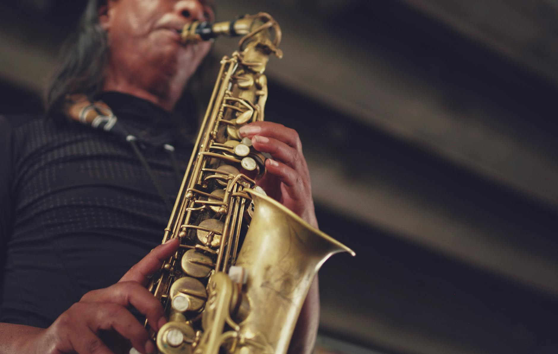 Live Music Venues and Jazz Bars 2 Jazz club saxophone player band stage moody lighting Munich