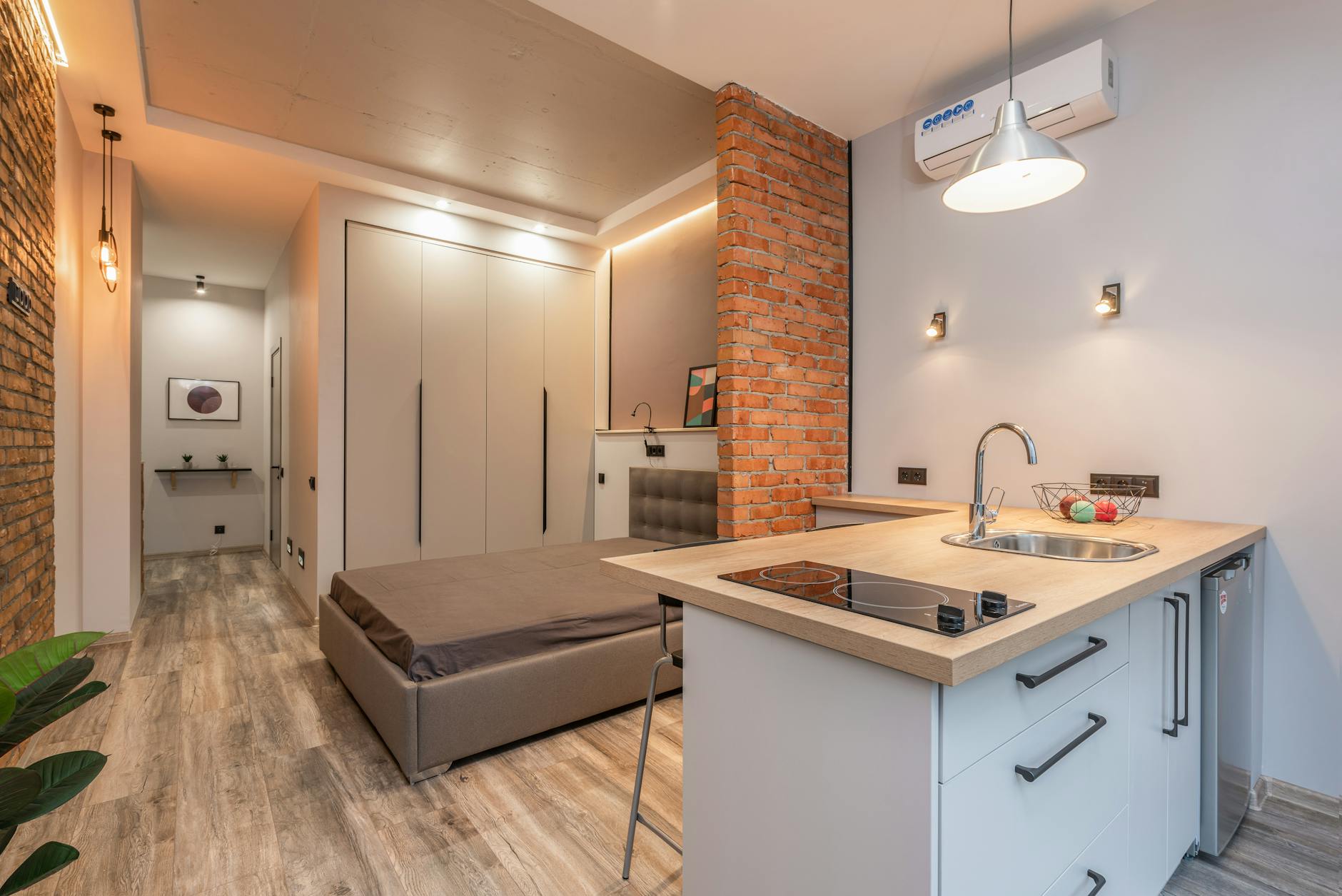 serviced apartments Munich modern bedroom kitchen design hotel longer stay
