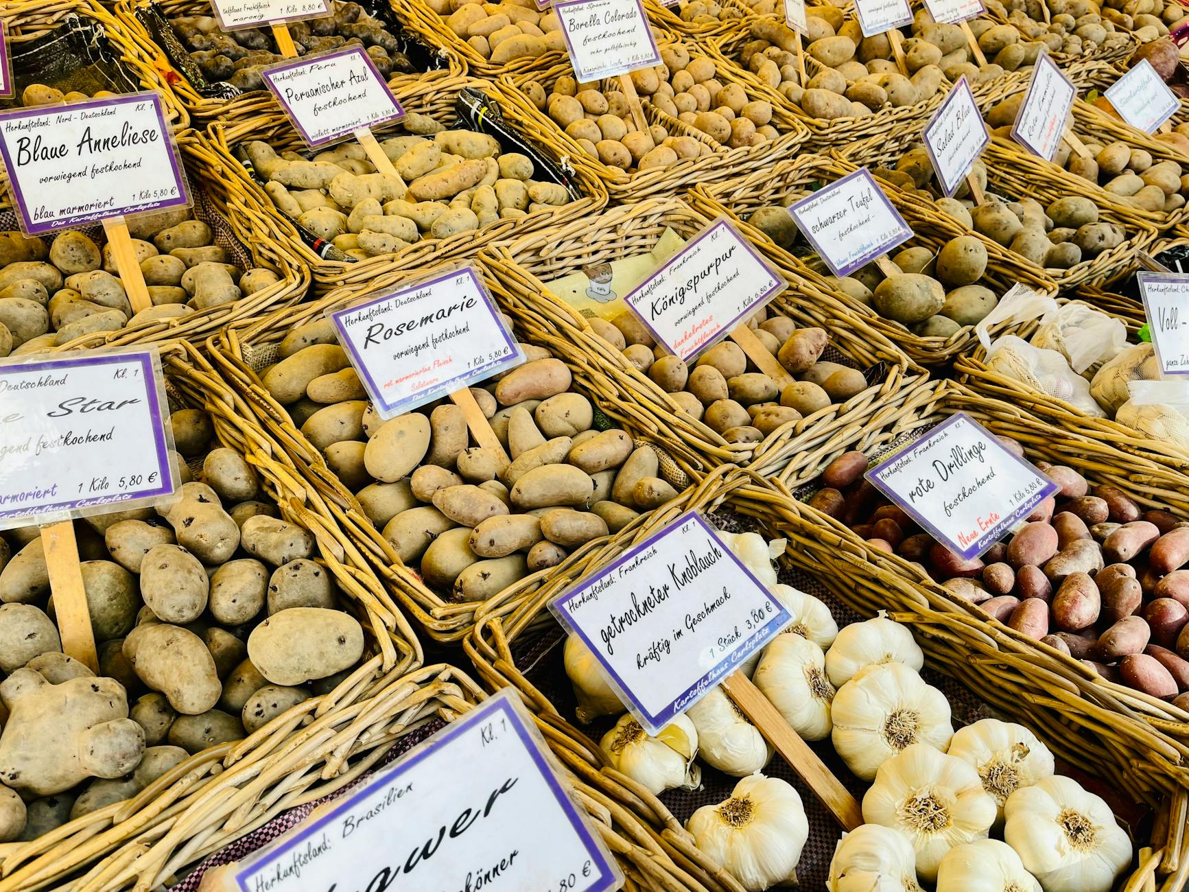 Viktualienmarkt Munich: Complete Guide to the Famous Food Market 4 Caspar Plautz potato stall Viktualienmarkt Munich heirloom potatoes shakshuka topping