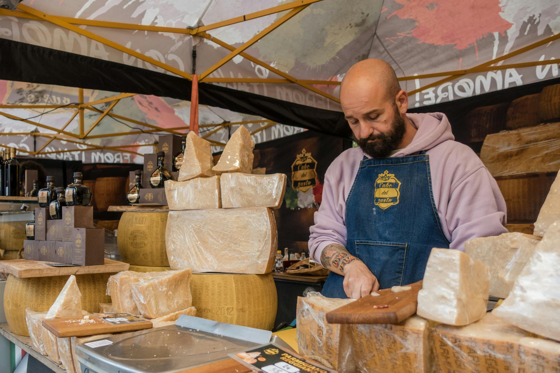 Viktualienmarkt Munich: Complete Guide to the Famous Food Market 5 Cheese stalls Viktualienmarkt food market Munich aged Alpine wheels French Swiss