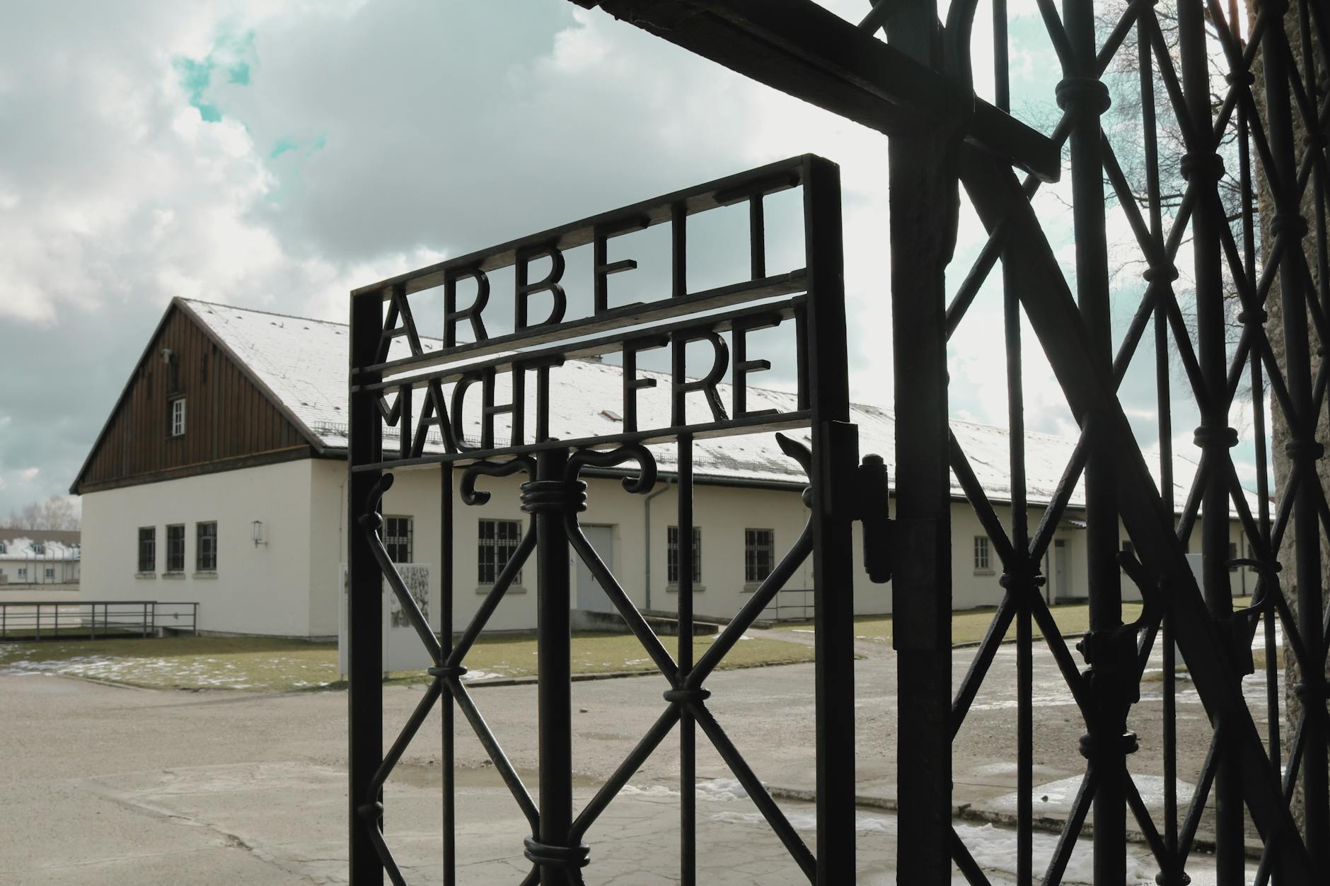 Dachau Memorial Day Trip from Munich 2 Iron gate at the entrance to the Dachau memorial visit site near Munich